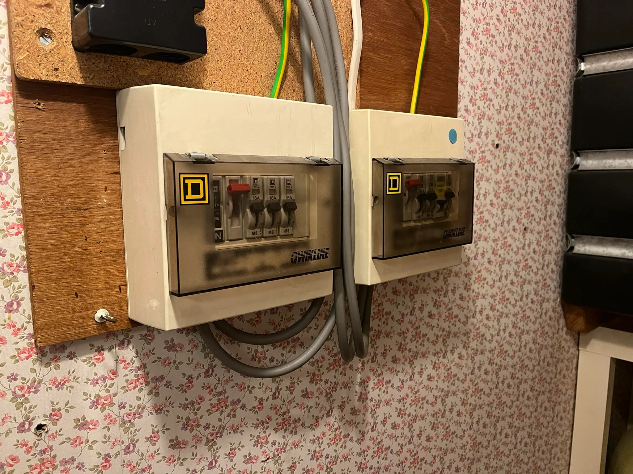 A couple of wires that are plugged into a wall.